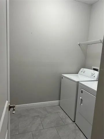 front view of a house with a garden