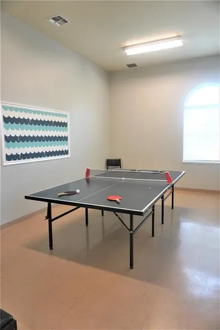 a view of swimming pool with outdoor seating