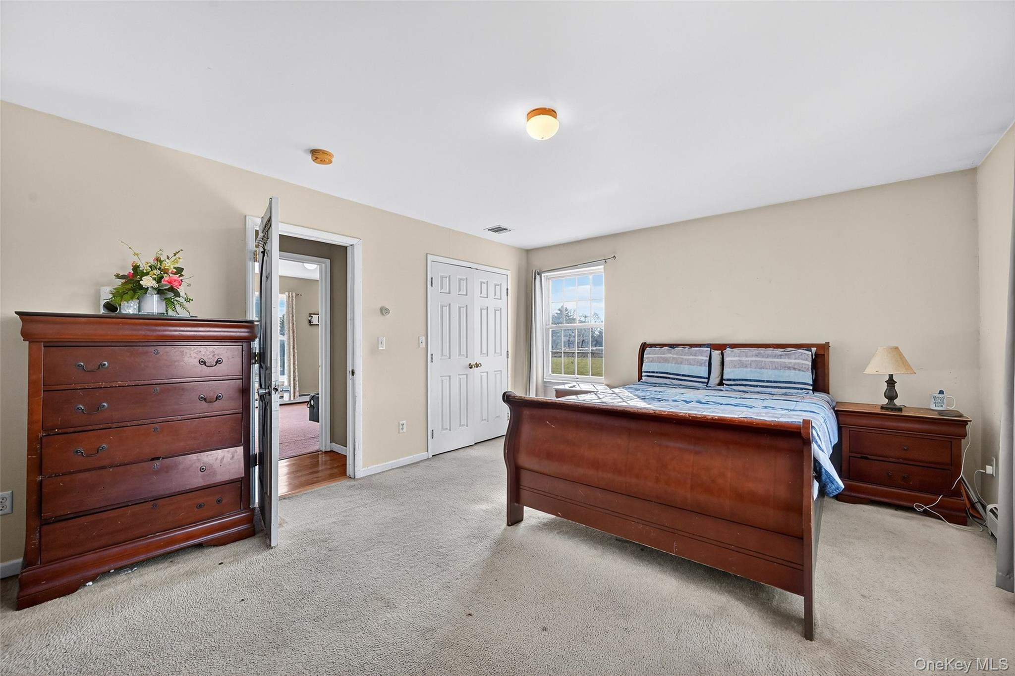 913 Silver Lake Sctn Road Middletown, NY 10941 - Photo 12 of 29 a bedroom with a bed and a dresser