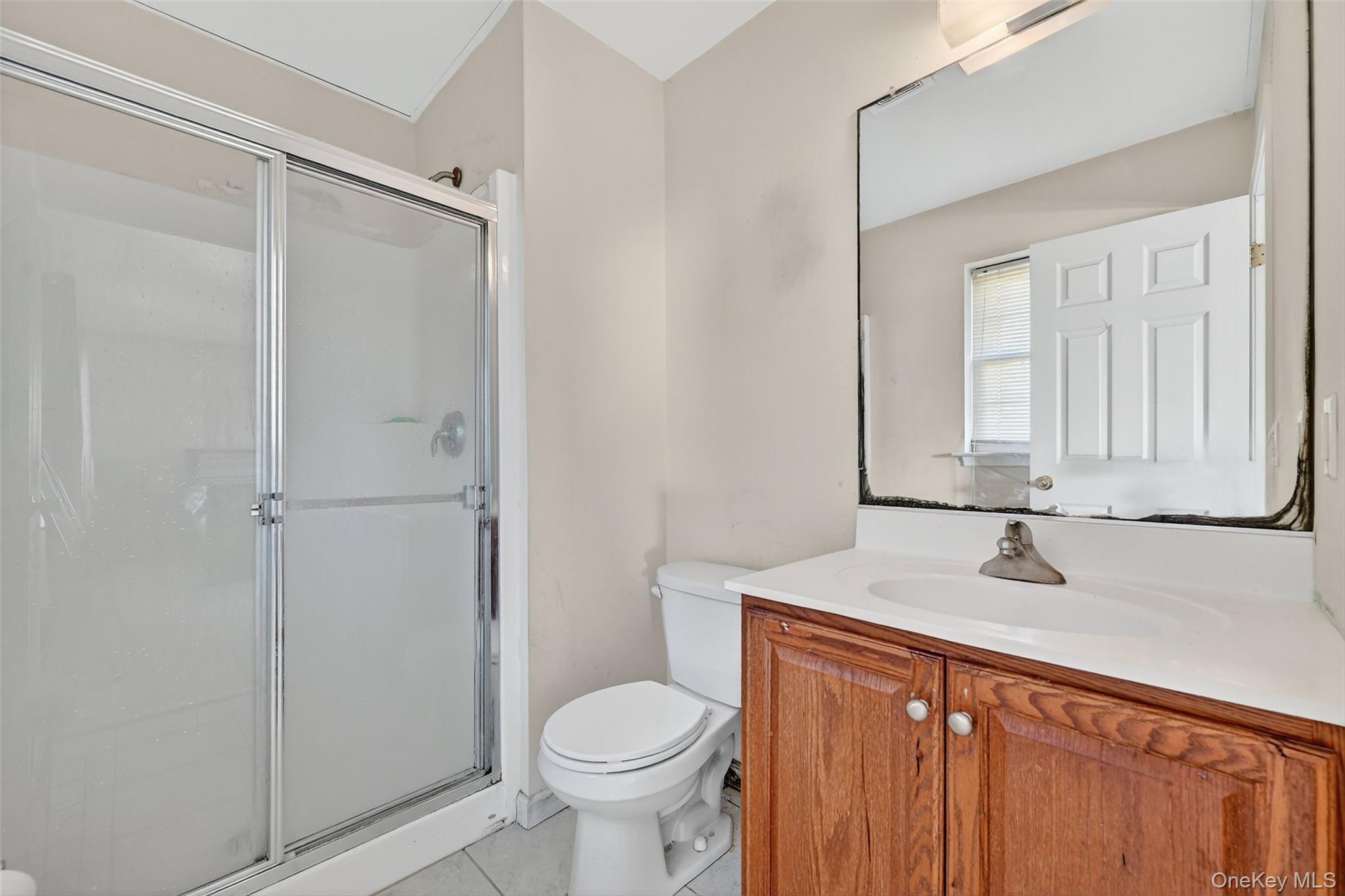 913 Silver Lake Sctn Road Middletown, NY 10941 - Photo 13 of 29 a bathroom with a sink and a toilet