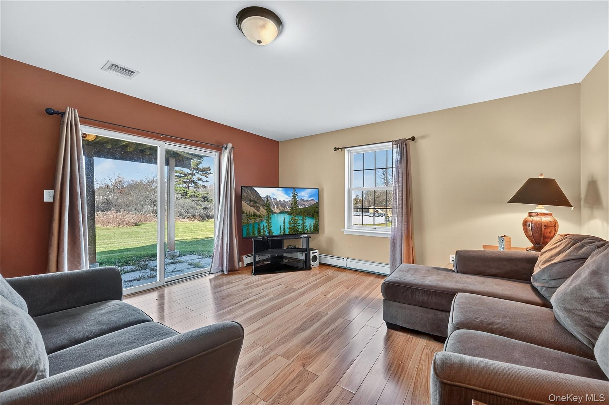 913 Silver Lake Sctn Road Middletown, NY 10941 - Photo 19 of 29 a living room with furniture and a large window