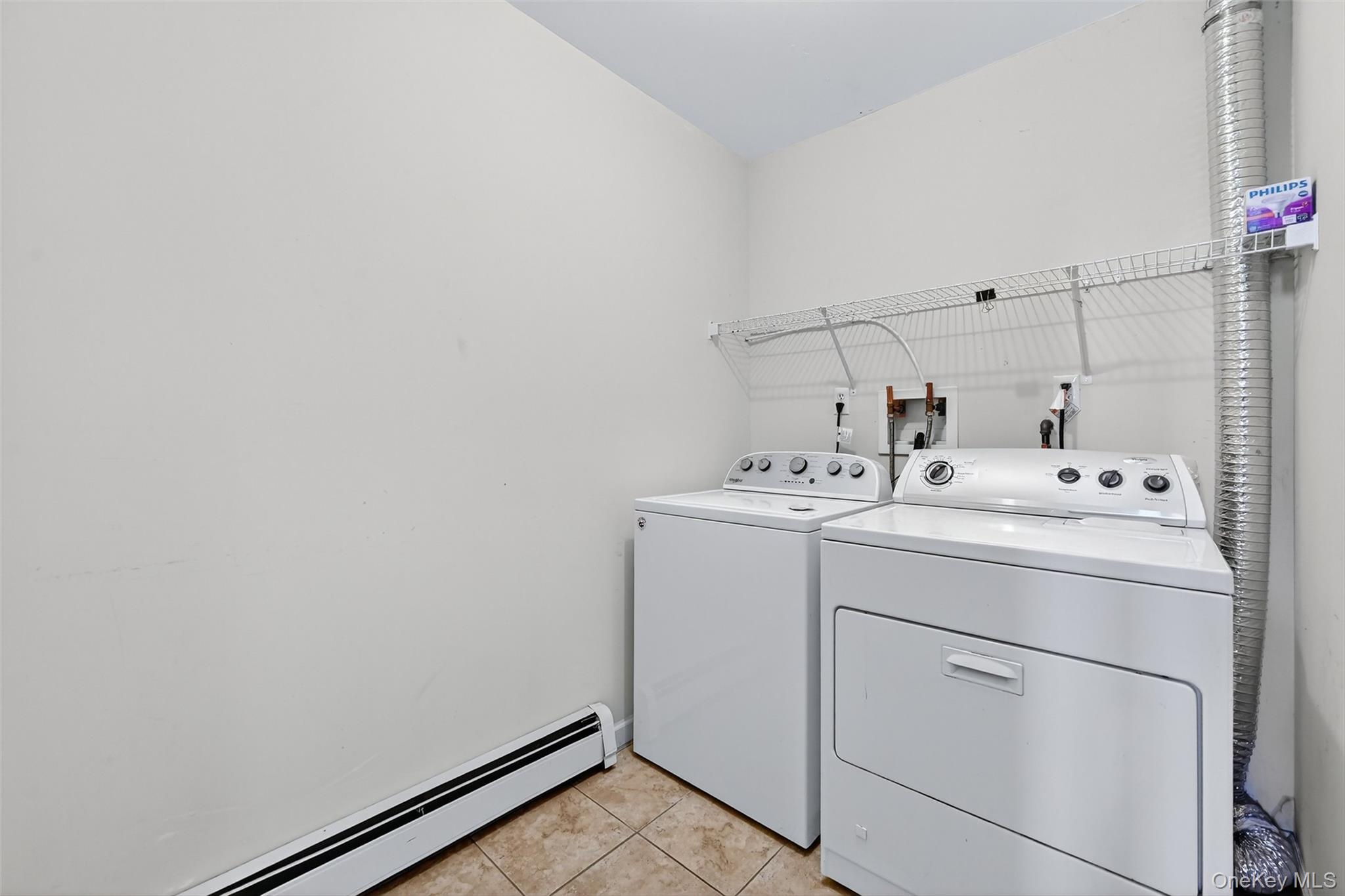 913 Silver Lake Sctn Road Middletown, NY 10941 - Photo 24 of 29 a utility room with dryer and washer