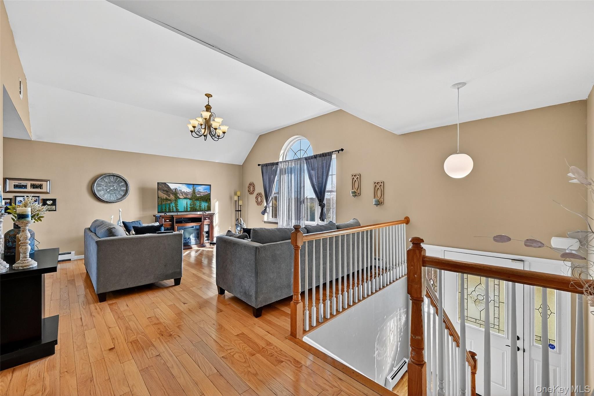 913 Silver Lake Sctn Road Middletown, NY 10941 - Photo 4 of 29 a living room with furniture and wooden floor