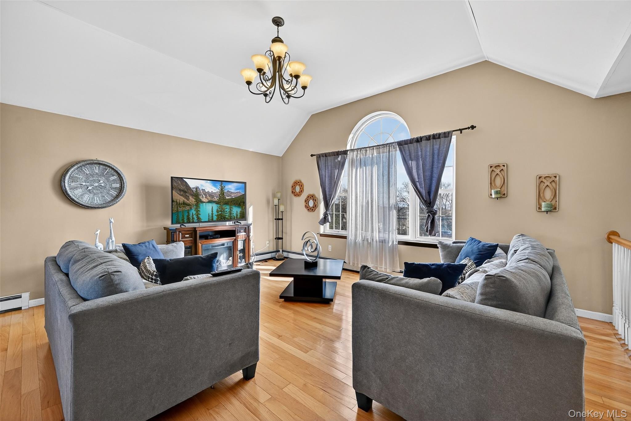 913 Silver Lake Sctn Road Middletown, NY 10941 - Photo 5 of 29 a living room with furniture and a large window
