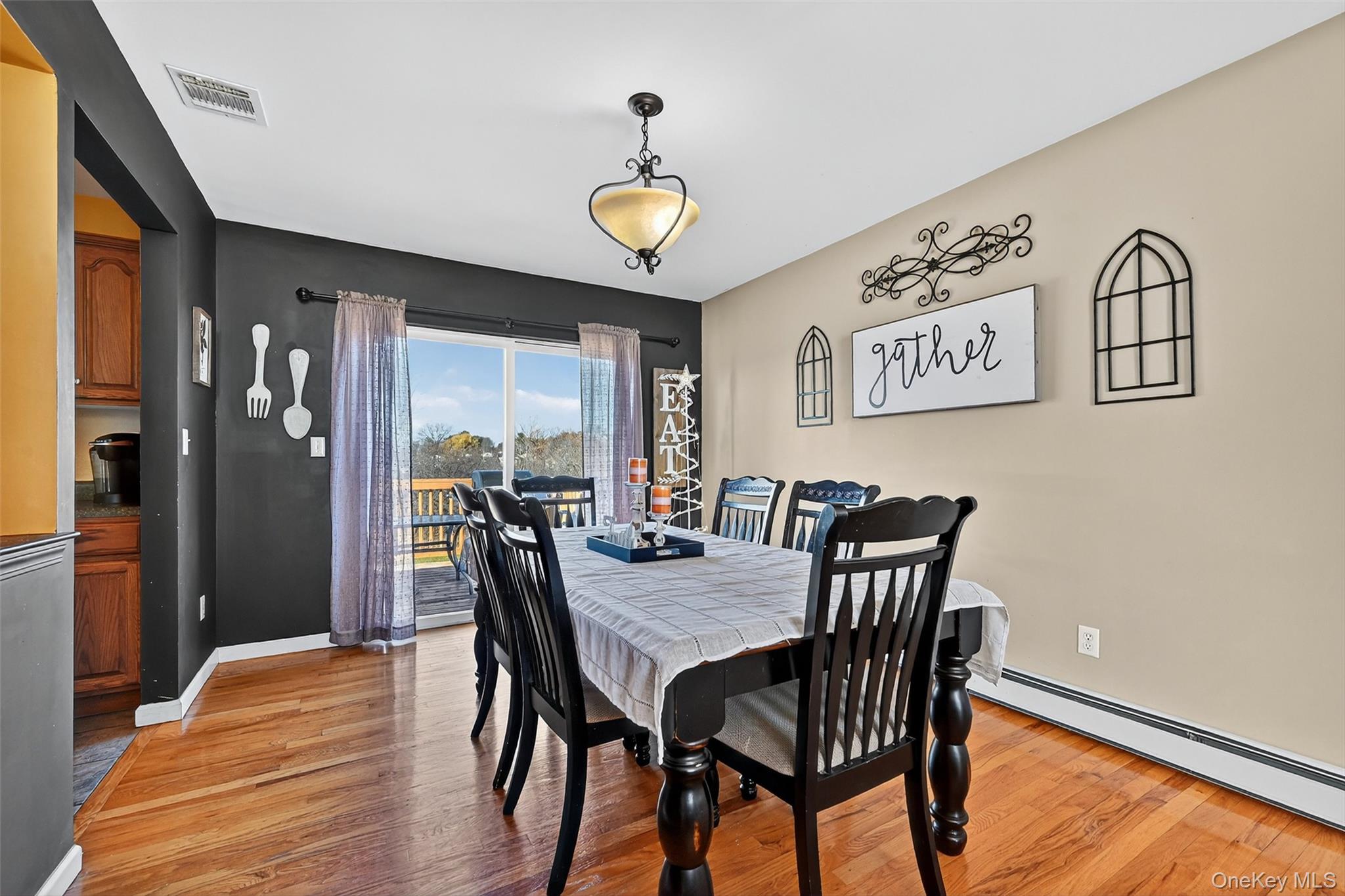 913 Silver Lake Sctn Road Middletown, NY 10941 - Photo 7 of 29 a view of a dining room with furniture and chandelier