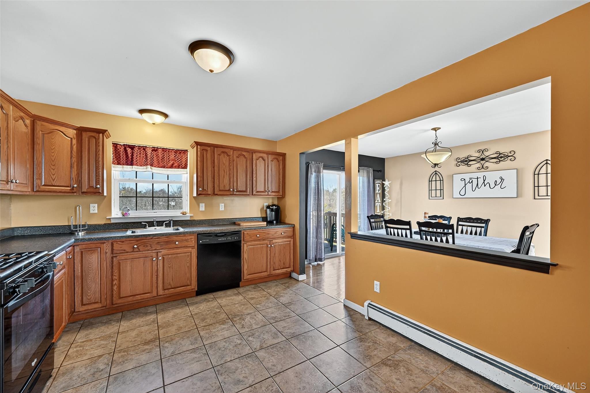 913 Silver Lake Sctn Road Middletown, NY 10941 - Photo 10 of 29 a large kitchen with stainless steel appliances granite countertop a stove and a sink