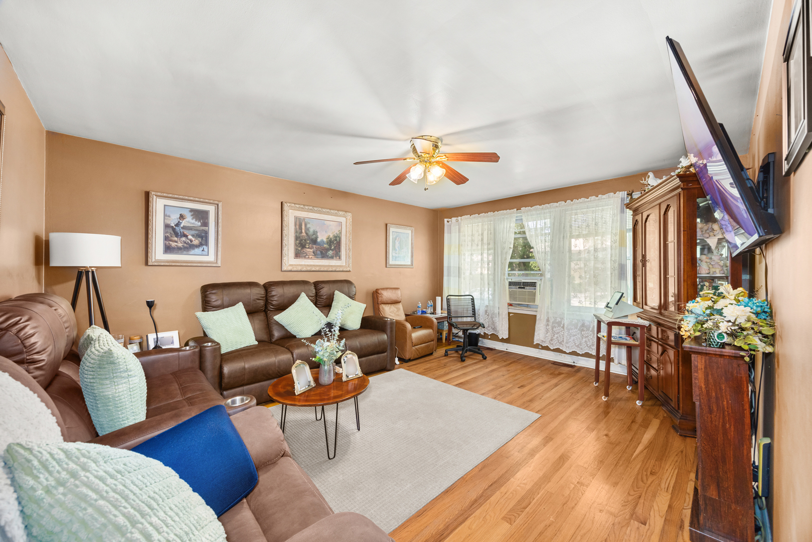 1406 Brummel Street Evanston, IL 60202 - Photo 12 of 20 a living room with furniture and a large window