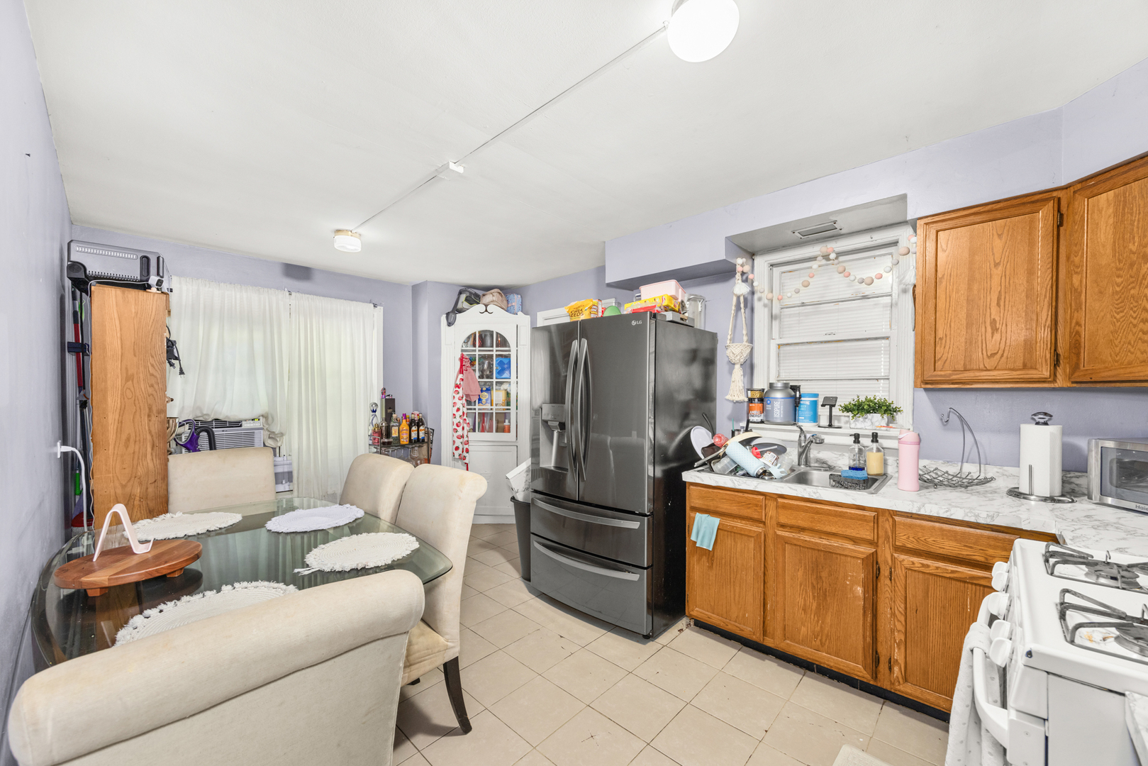 1406 Brummel Street Evanston, IL 60202 - Photo 17 of 20 a kitchen with a refrigerator and a sink