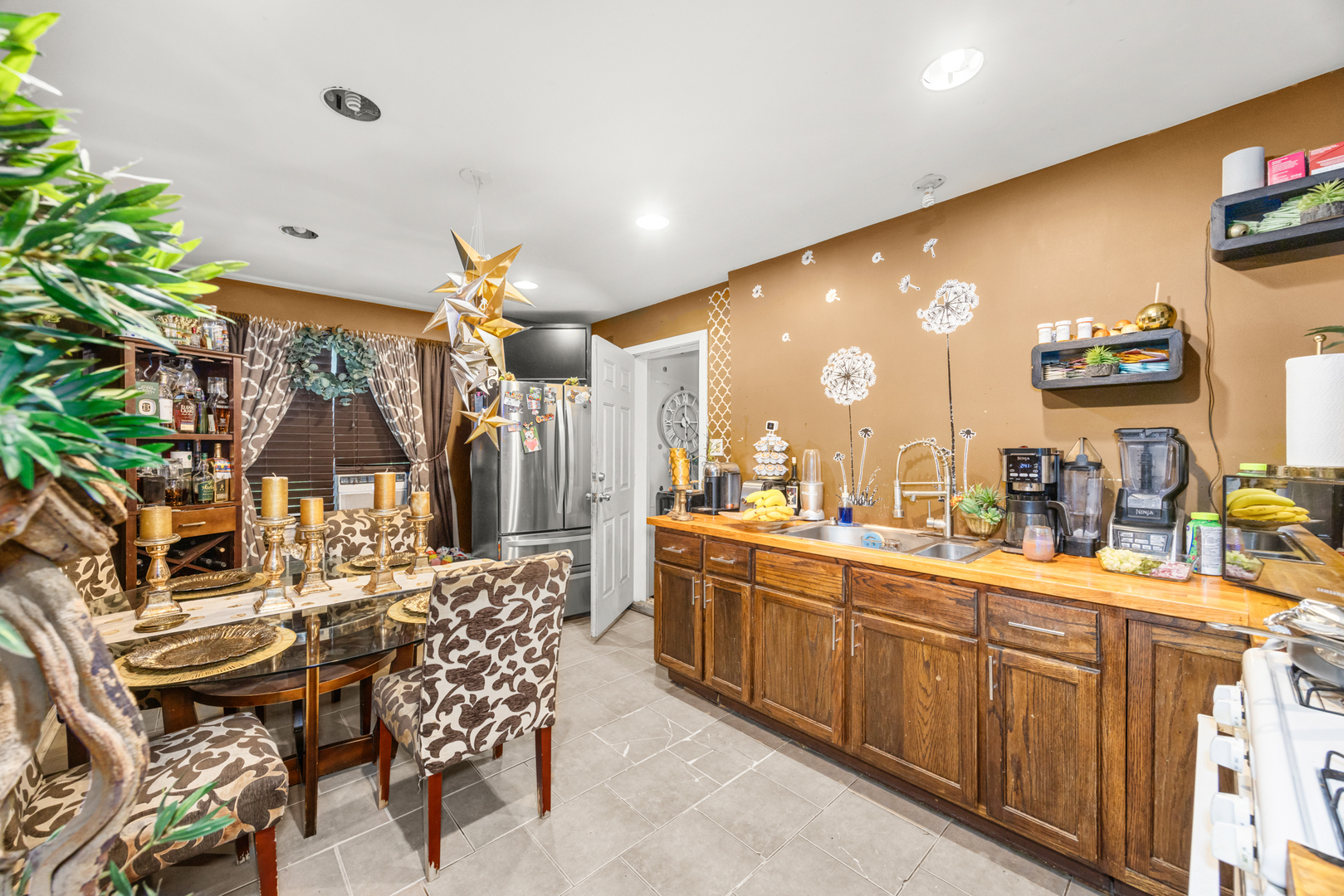 1406 Brummel Street Evanston, IL 60202 - Photo 3 of 20 a large kitchen with a table and chairs