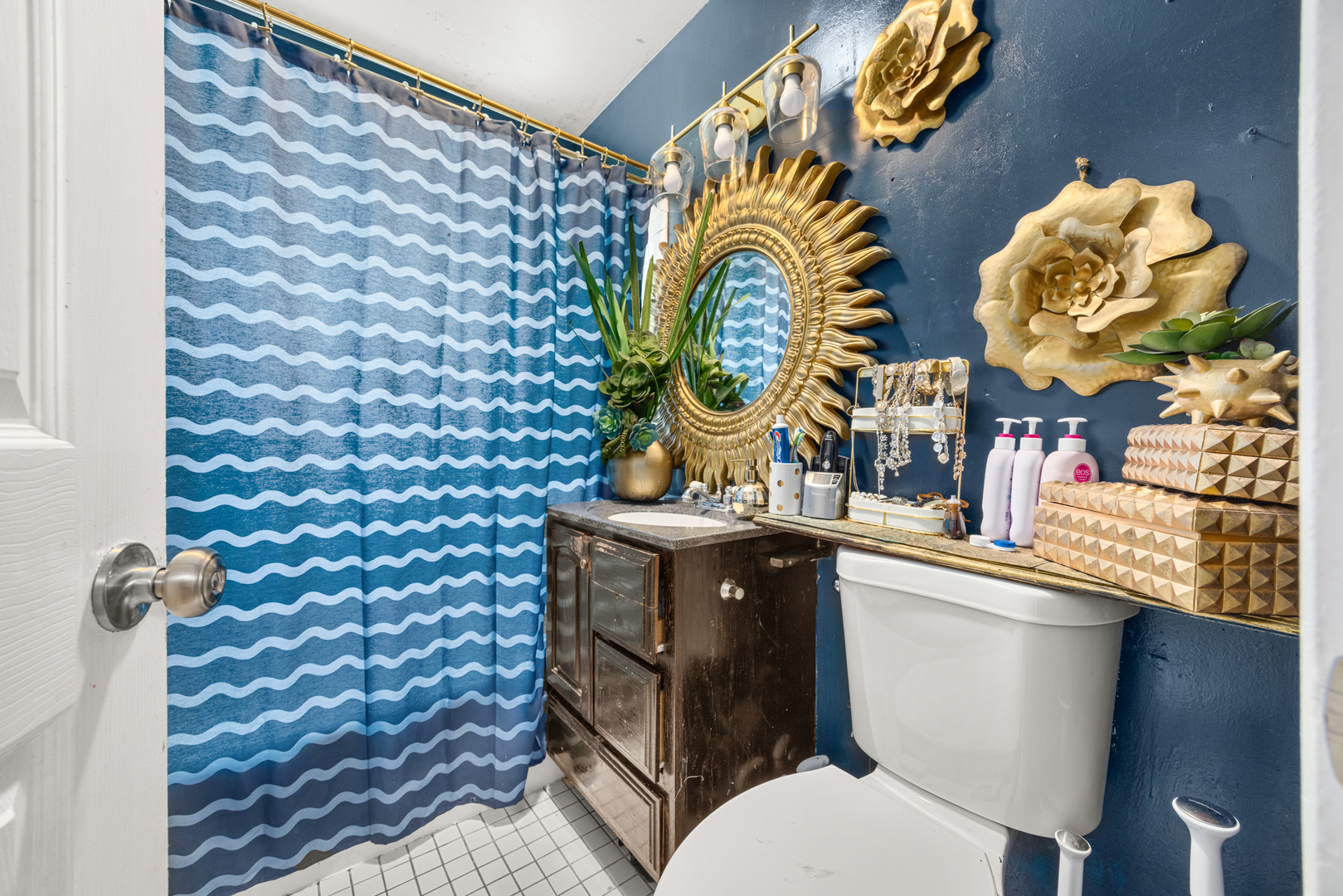 1406 Brummel Street Evanston, IL 60202 - Photo 5 of 20 a bathroom with a sink mirror vanity and toilet