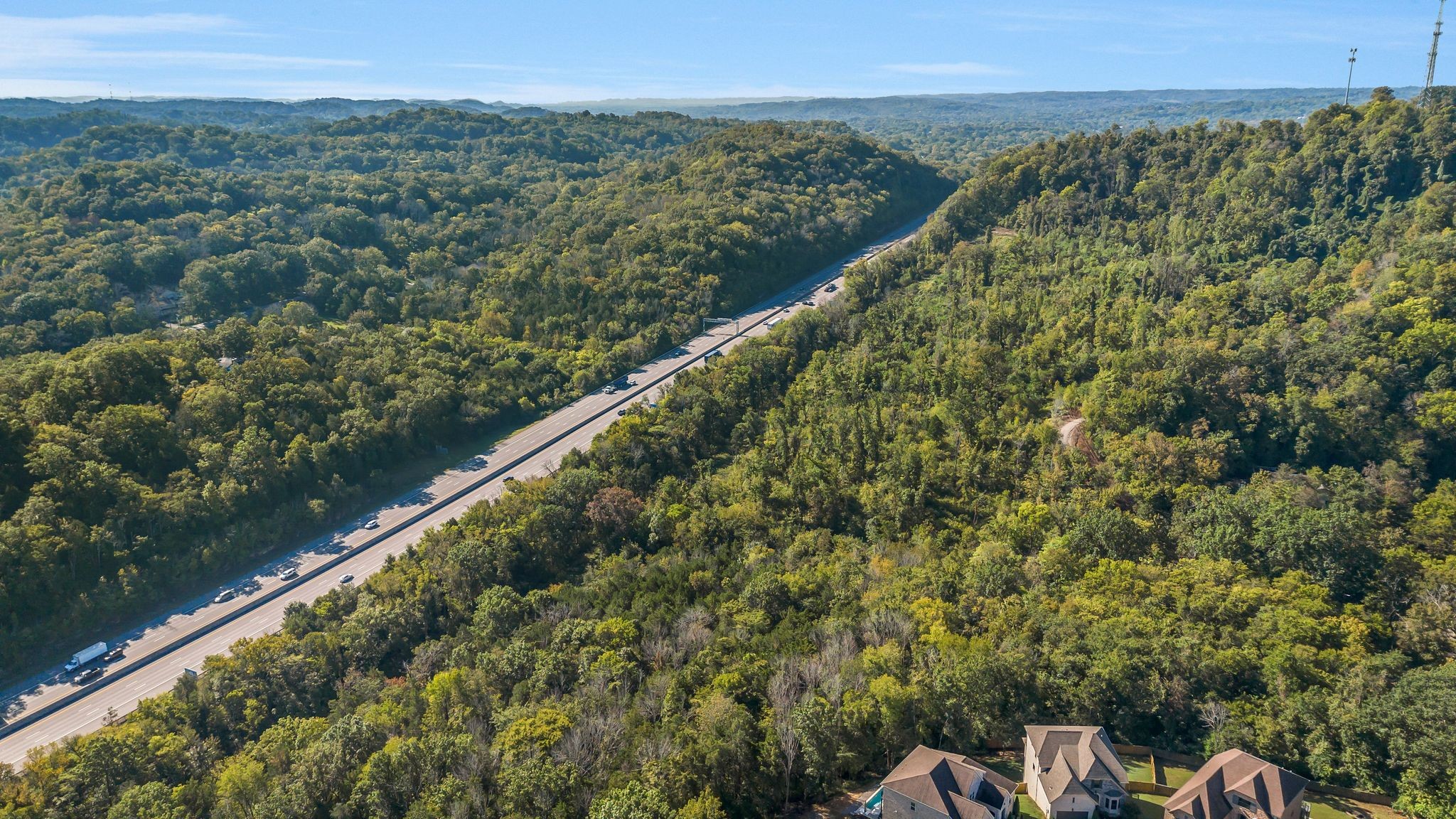 290 Forrest Valley Circle Nashville, TN 37209 - Photo 8 of 20 a view of a green field with mountains in the background