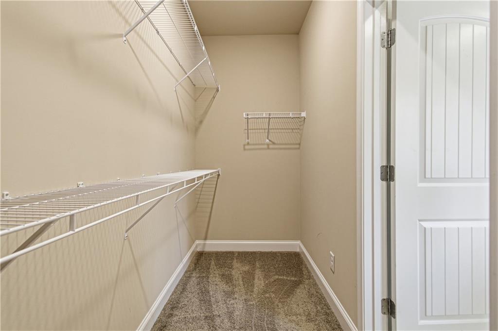 114 Madison Street Canton, GA 30115 - Photo 26 of 39 a view of walk in closet