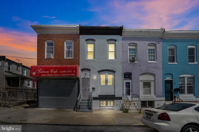 a house with trees in front of it