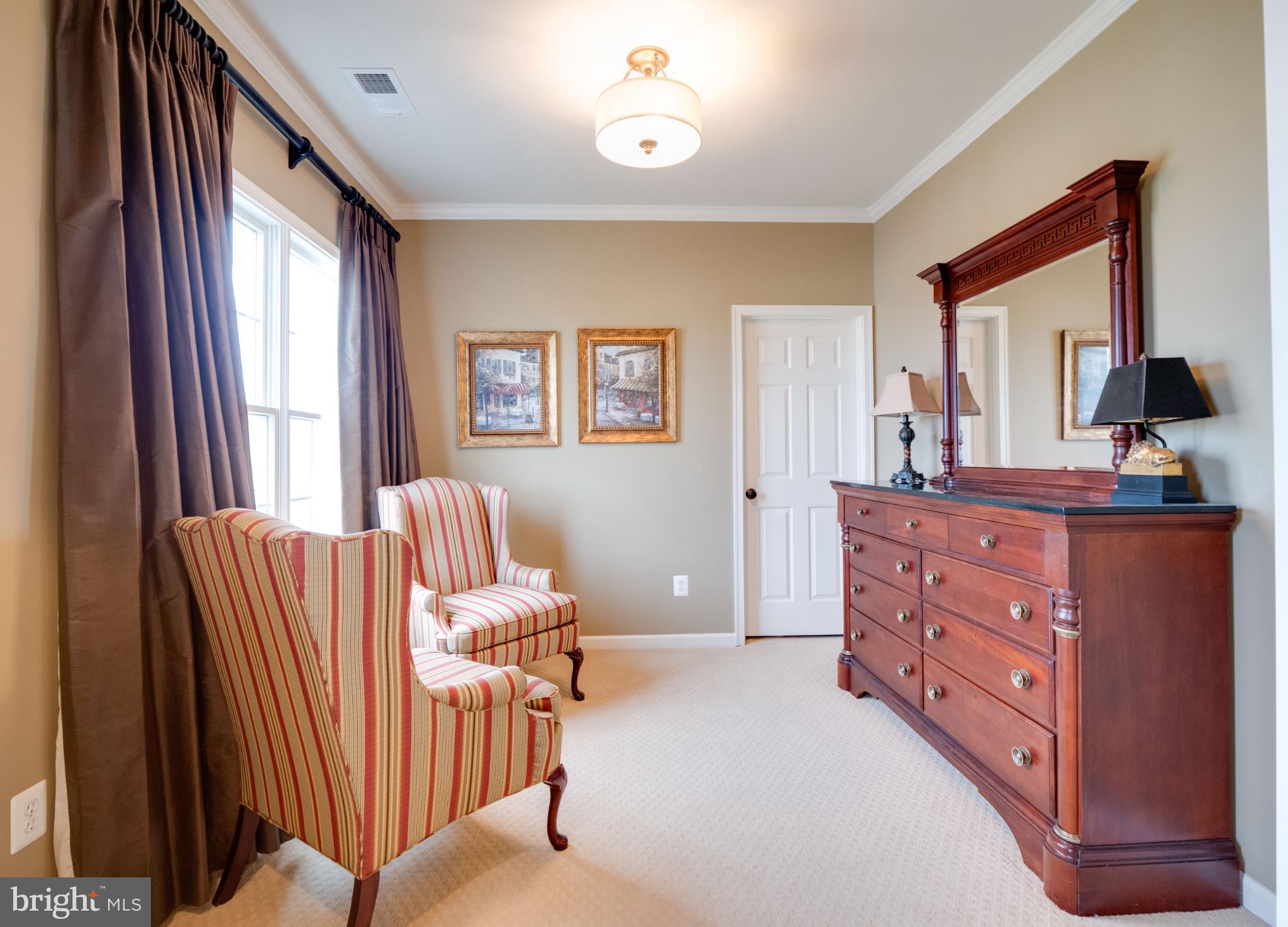 23152 Evergreen Ridge Drive Ashburn, VA 20148 - Photo 35 of 72 Elegant sitting area with natural light.