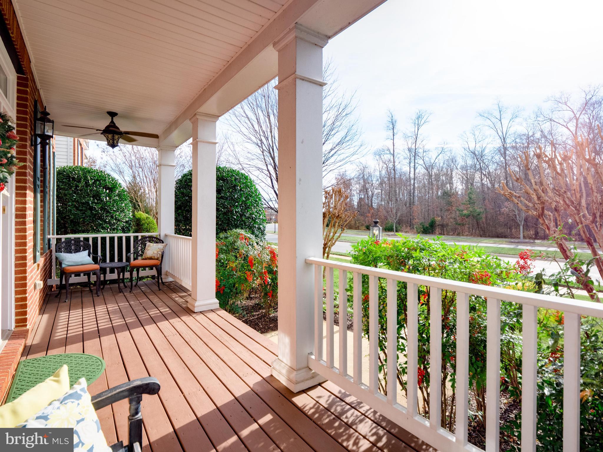 23152 Evergreen Ridge Drive Ashburn, VA 20148 - Photo 4 of 72 Charming porch with lush greenery views.