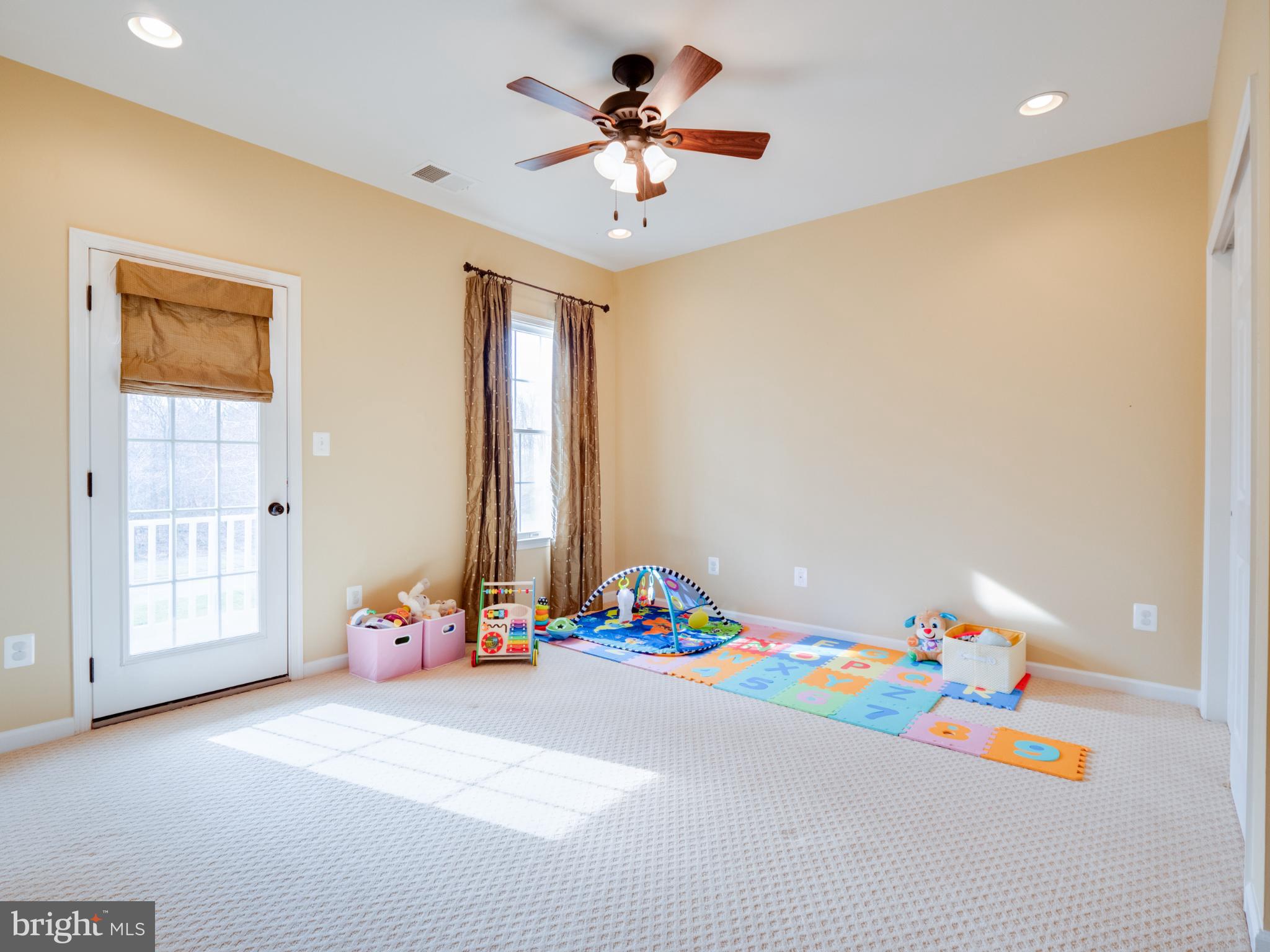 23152 Evergreen Ridge Drive Ashburn, VA 20148 - Photo 47 of 72 Bright and inviting playroom with natural light.