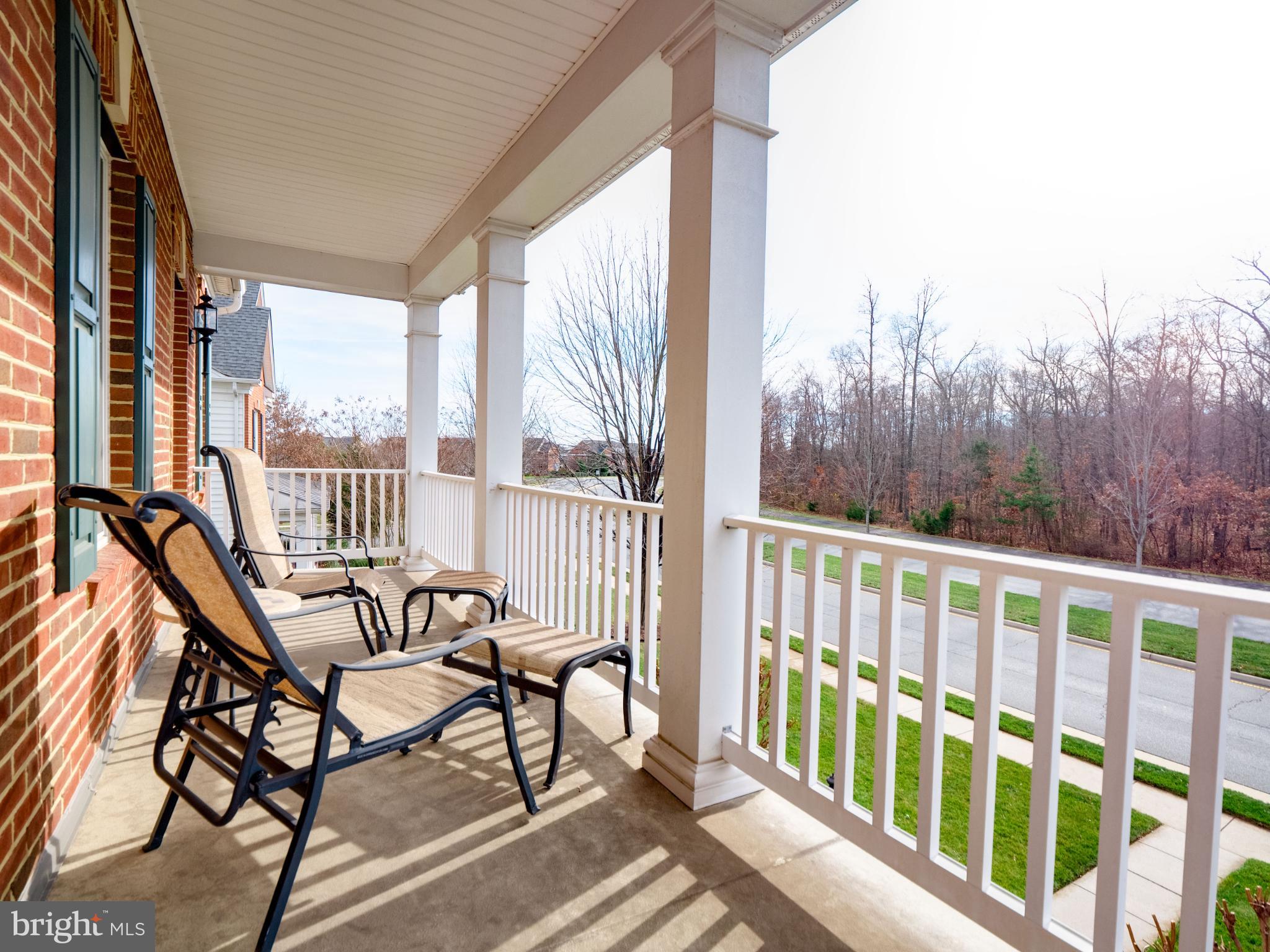 23152 Evergreen Ridge Drive Ashburn, VA 20148 - Photo 49 of 72 Inviting porch with serene woodland views.