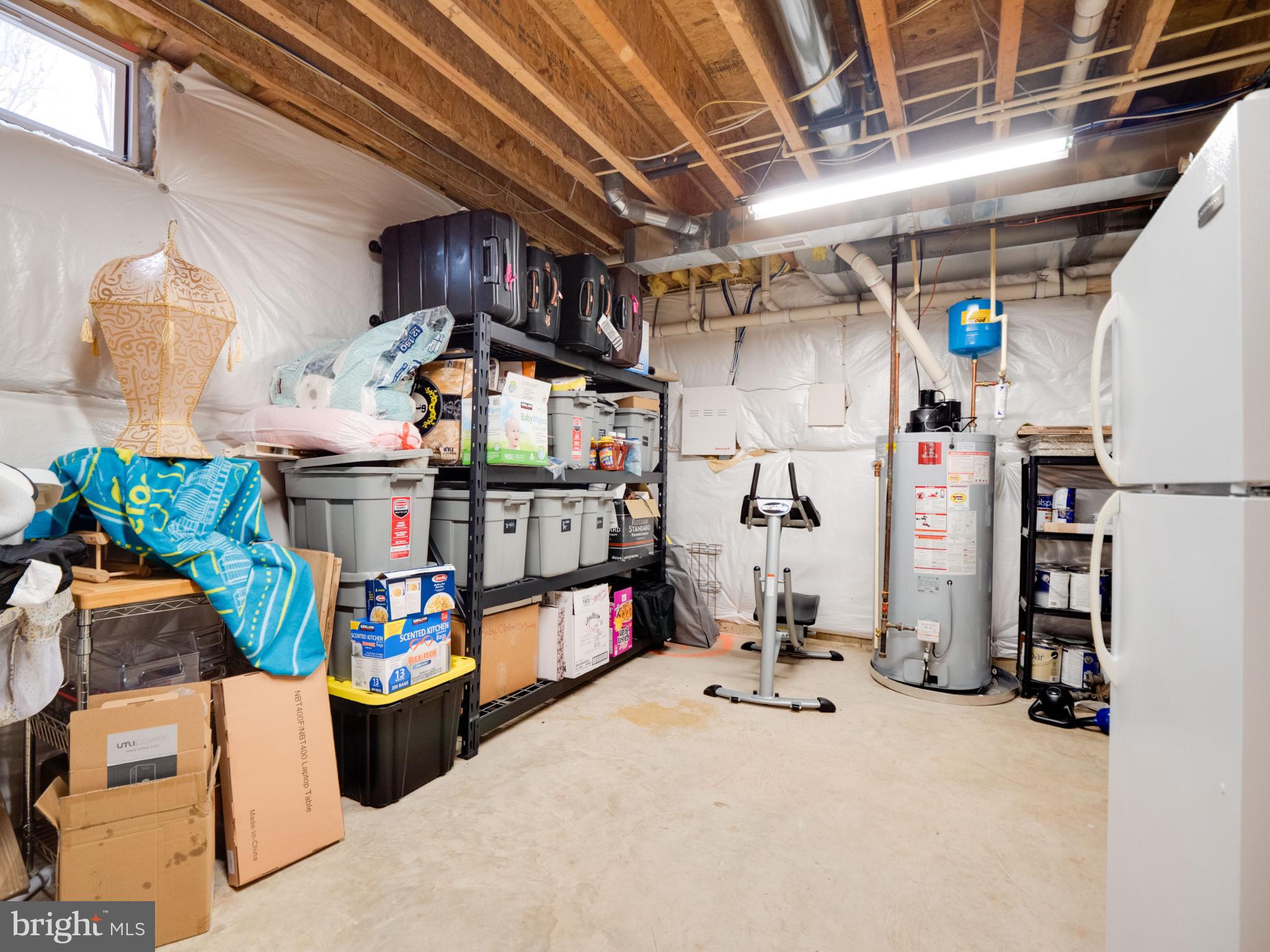 23152 Evergreen Ridge Drive Ashburn, VA 20148 - Photo 59 of 72 Spacious basement with organized storage.