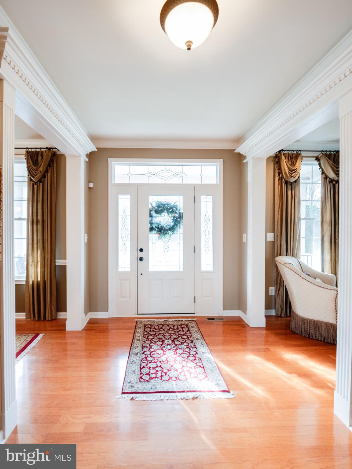 23152 Evergreen Ridge Drive Ashburn, VA 20148 - Photo 6 of 72 Welcoming entryway with elegant charm.