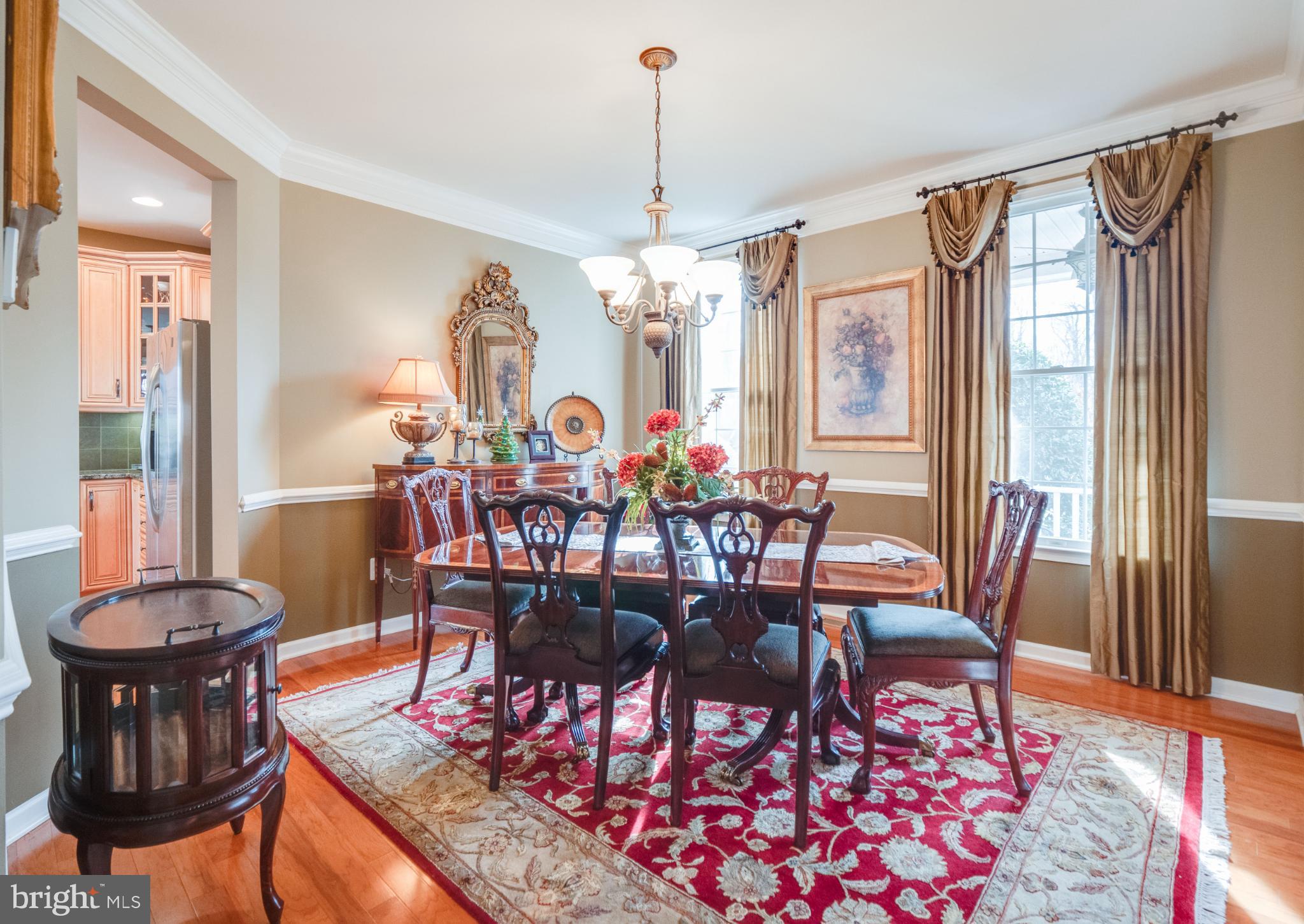 23152 Evergreen Ridge Drive Ashburn, VA 20148 - Photo 10 of 72 Elegant dining space with rich decor.
