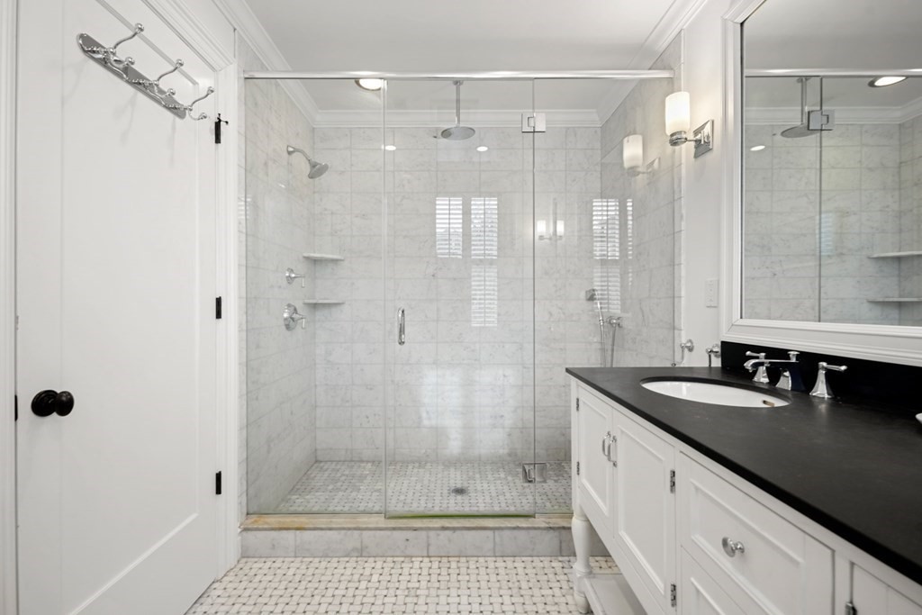 212 West Springfield Street, Unit 2 Boston, MA 02118 - Photo 20 of 41 a bathroom with a shower sink and mirror