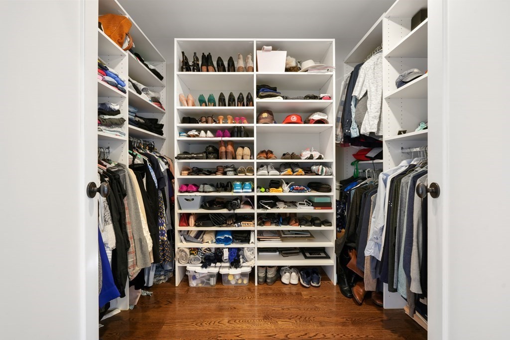 212 West Springfield Street, Unit 2 Boston, MA 02118 - Photo 23 of 41 a view of walk in closet with clothes and shoes