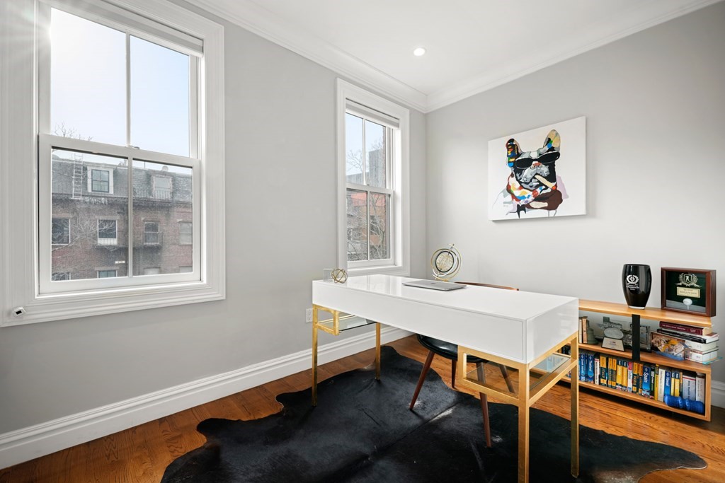 212 West Springfield Street, Unit 2 Boston, MA 02118 - Photo 24 of 41 a view of a workspace with furniture and a window