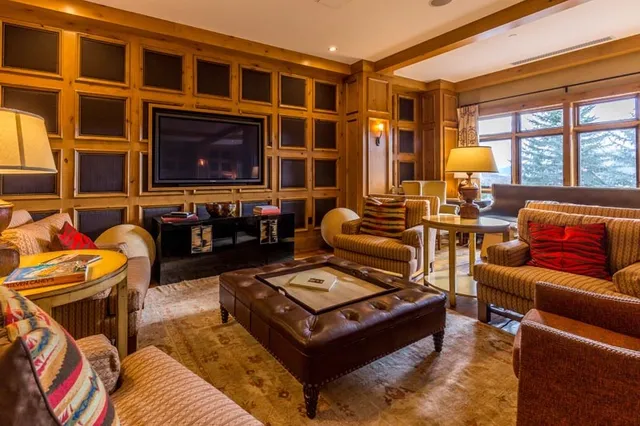 a view of a swimming pool with chairs