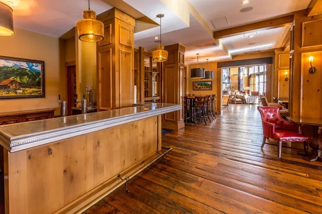 a view of living room with kitchen