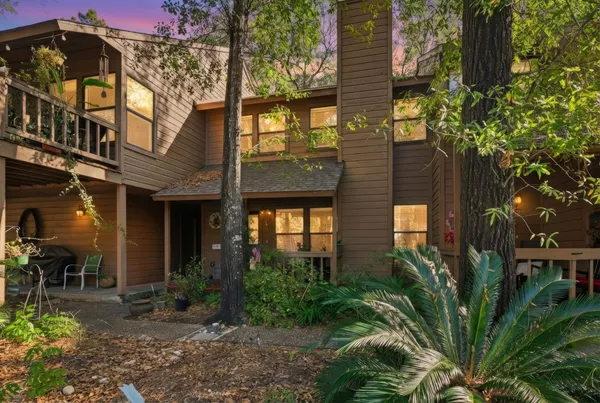 a view of a building with a garden