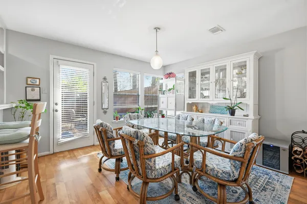 a view of a dining room with furniture window and outside view
