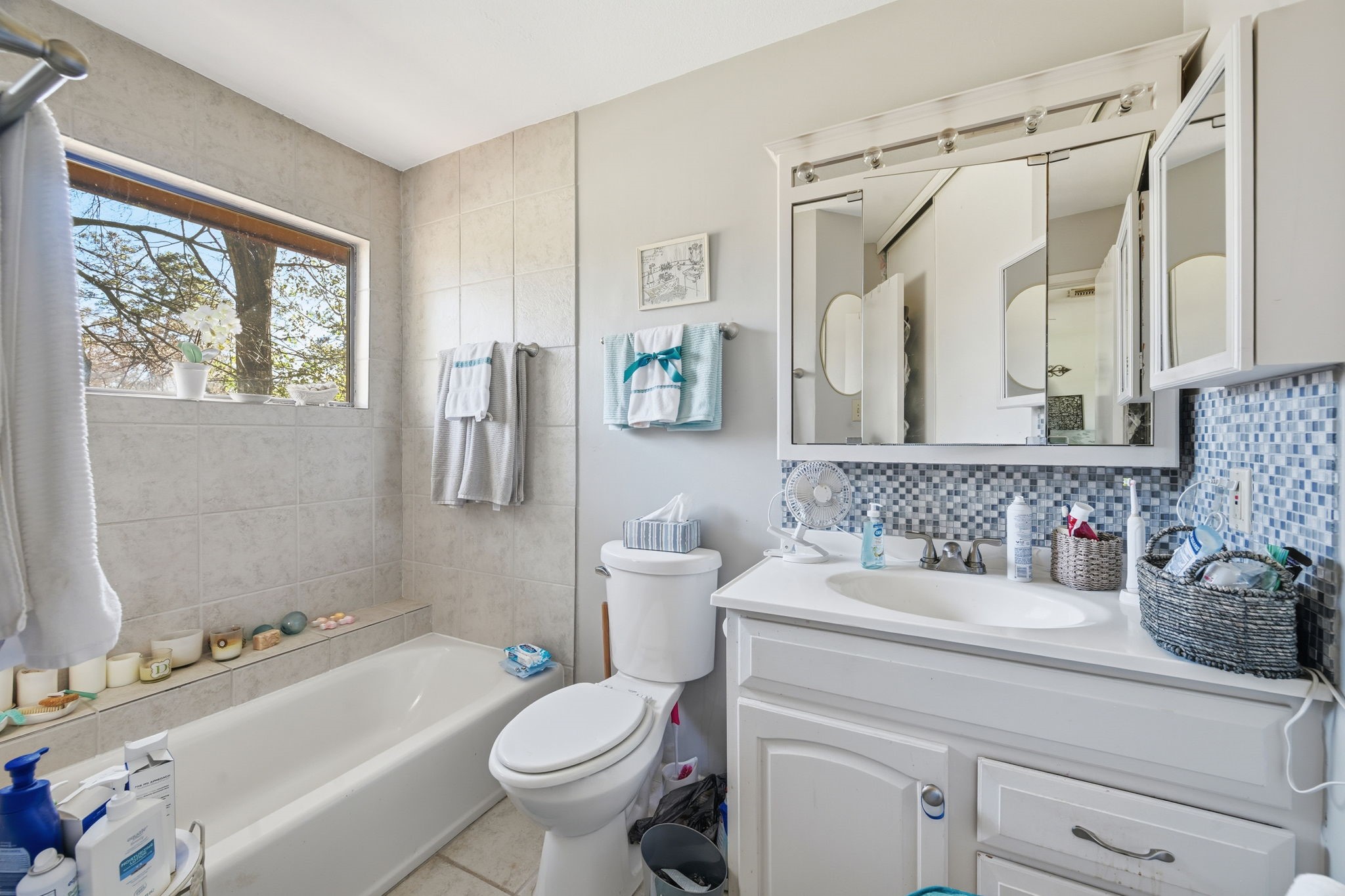 4 Sawmill Grove Lane Spring, TX 77380 - Photo 21 of 27 a bathroom with a sink toilet and shower