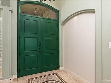 2709 Cardinal Avenue McAllen, TX 78504 - Photo 2 of 19 a bathroom with a mirror and a shower