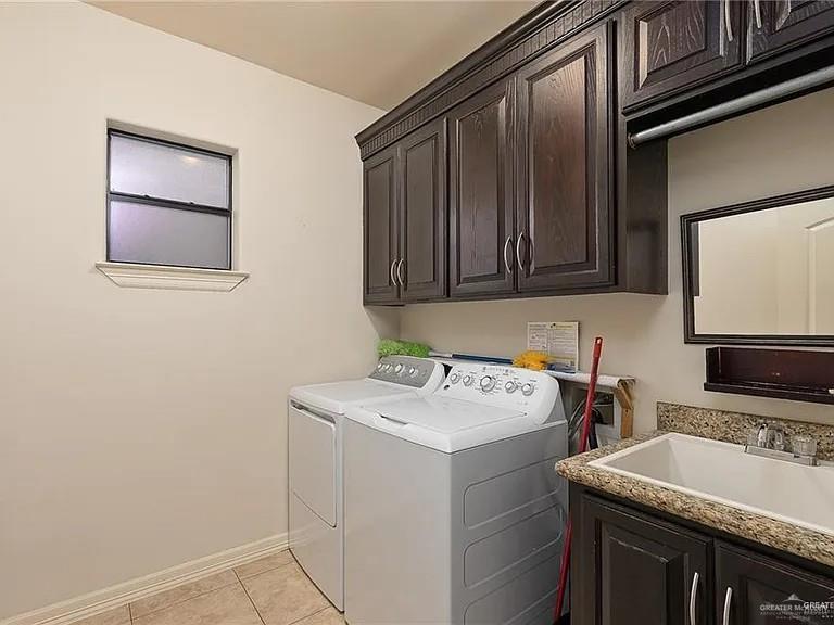 2709 Cardinal Avenue McAllen, TX 78504 - Photo 9 of 19 a utility room with dryer and washer