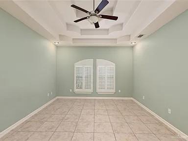 2709 Cardinal Avenue McAllen, TX 78504 - Photo 10 of 19 an empty room with windows and fan