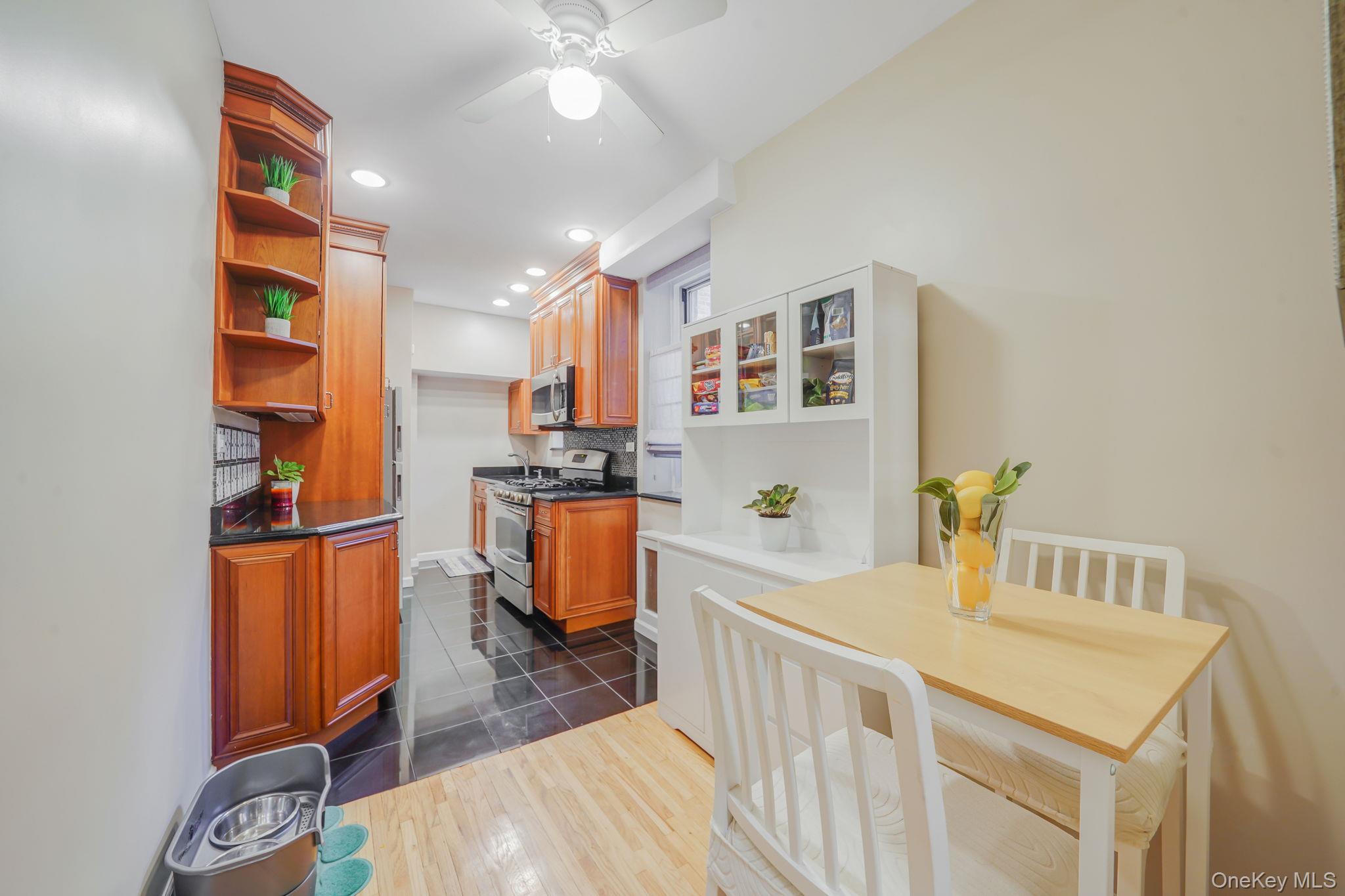 640 West 231st Street, Unit 1F Bronx, NY 10463 - Photo 6 of 17 a view of a kitchen and dining room