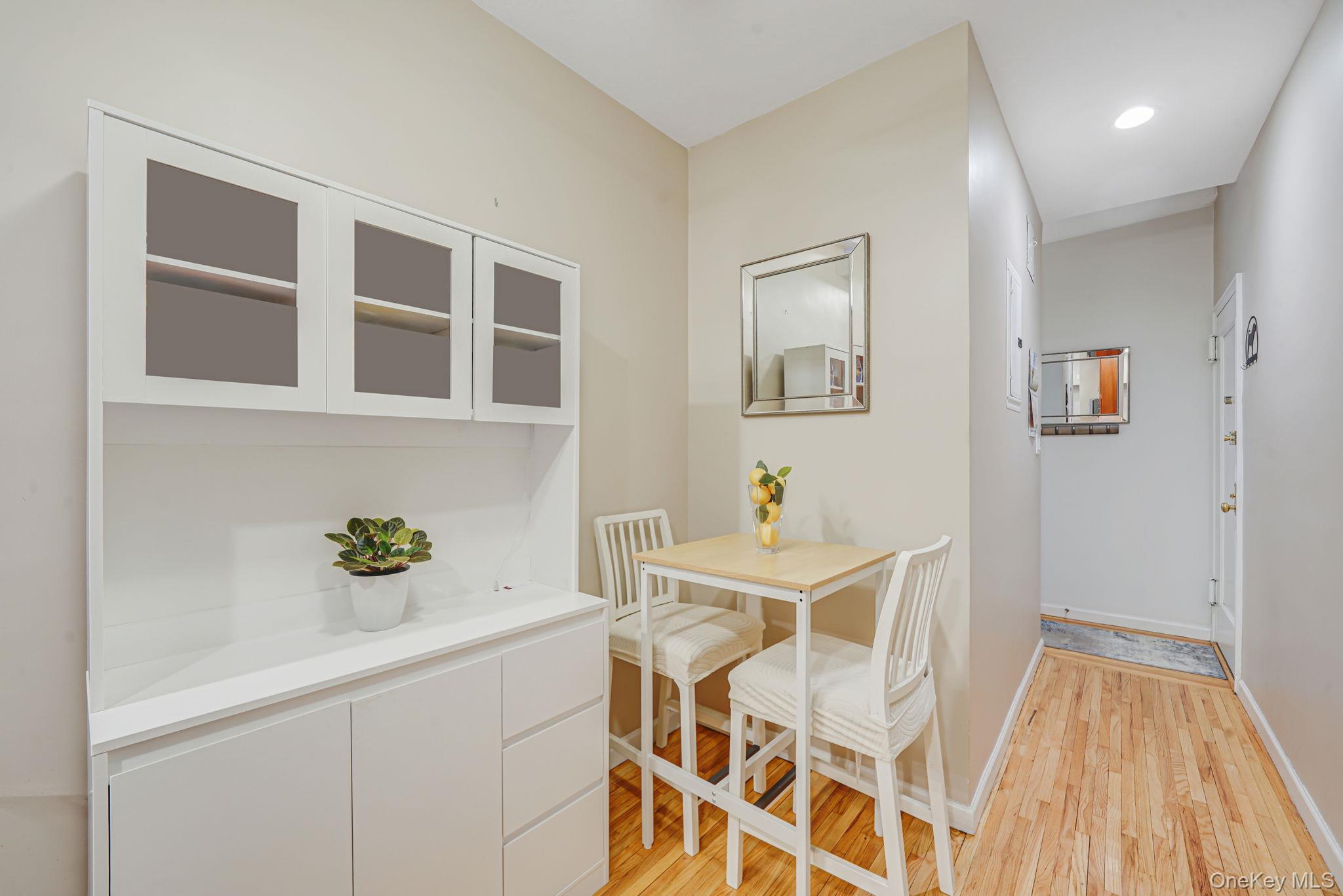 640 West 231st Street, Unit 1F Bronx, NY 10463 - Photo 7 of 17 a view of dining room and wooden floor