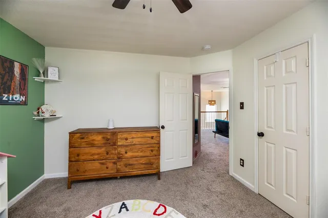 a room with furniture and a chandelier
