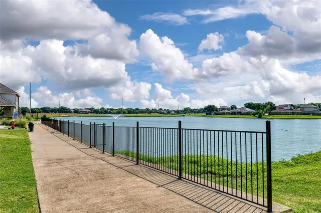 a view of a lake with a city view