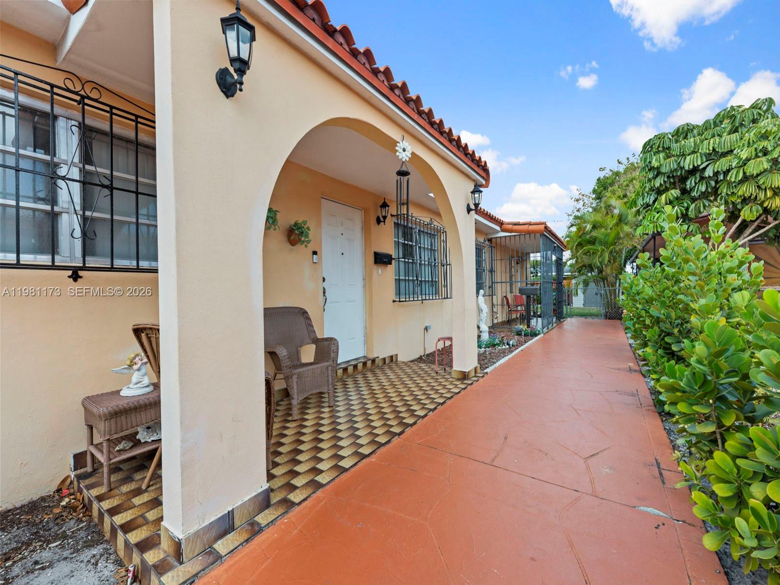 27 East 12th Street Hialeah, FL 33010 - Photo 22 of 24 a view of a house with a balcony