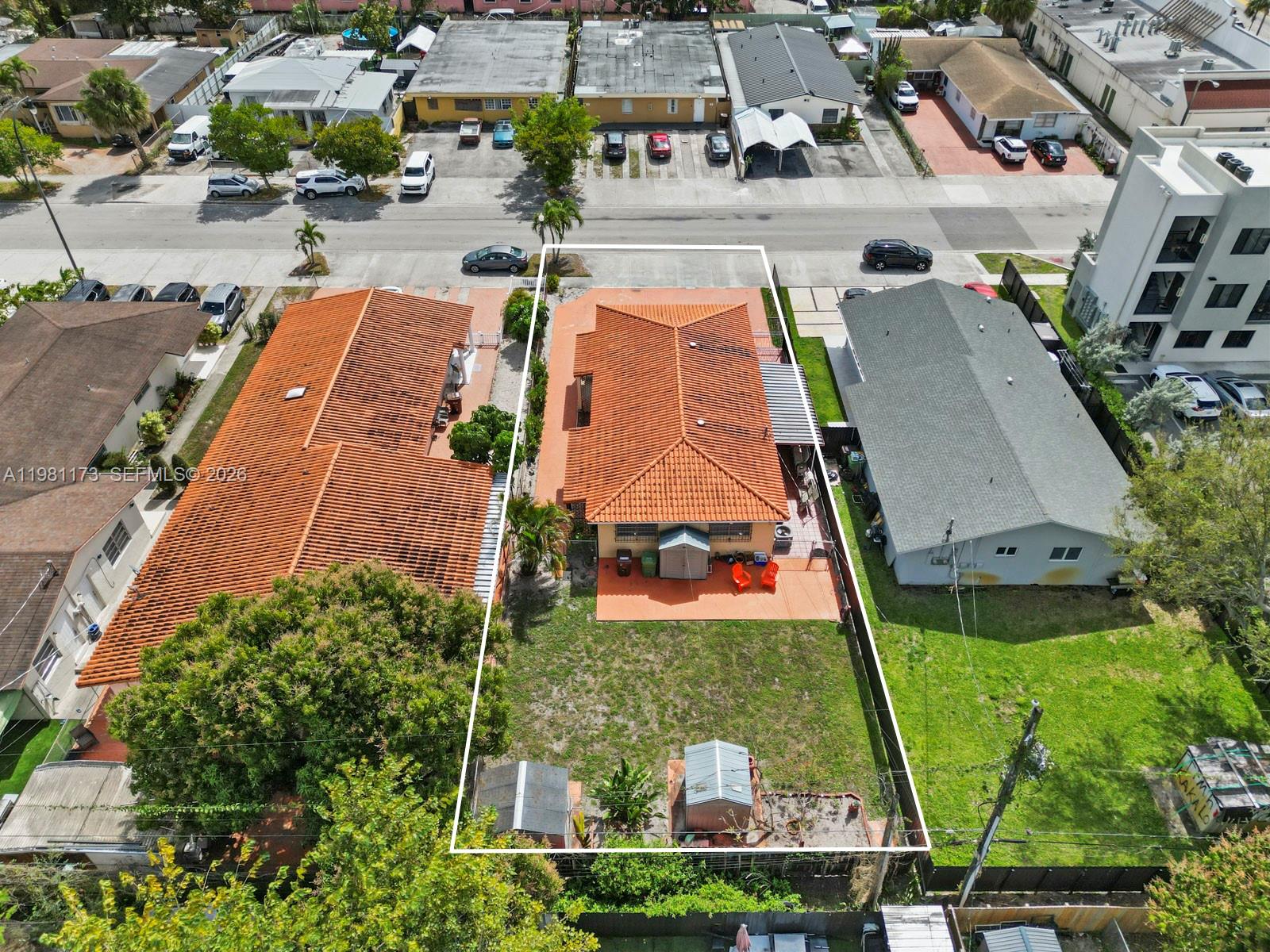 27 East 12th Street Hialeah, FL 33010 - Photo 4 of 24 an aerial view of multiple houses with yard