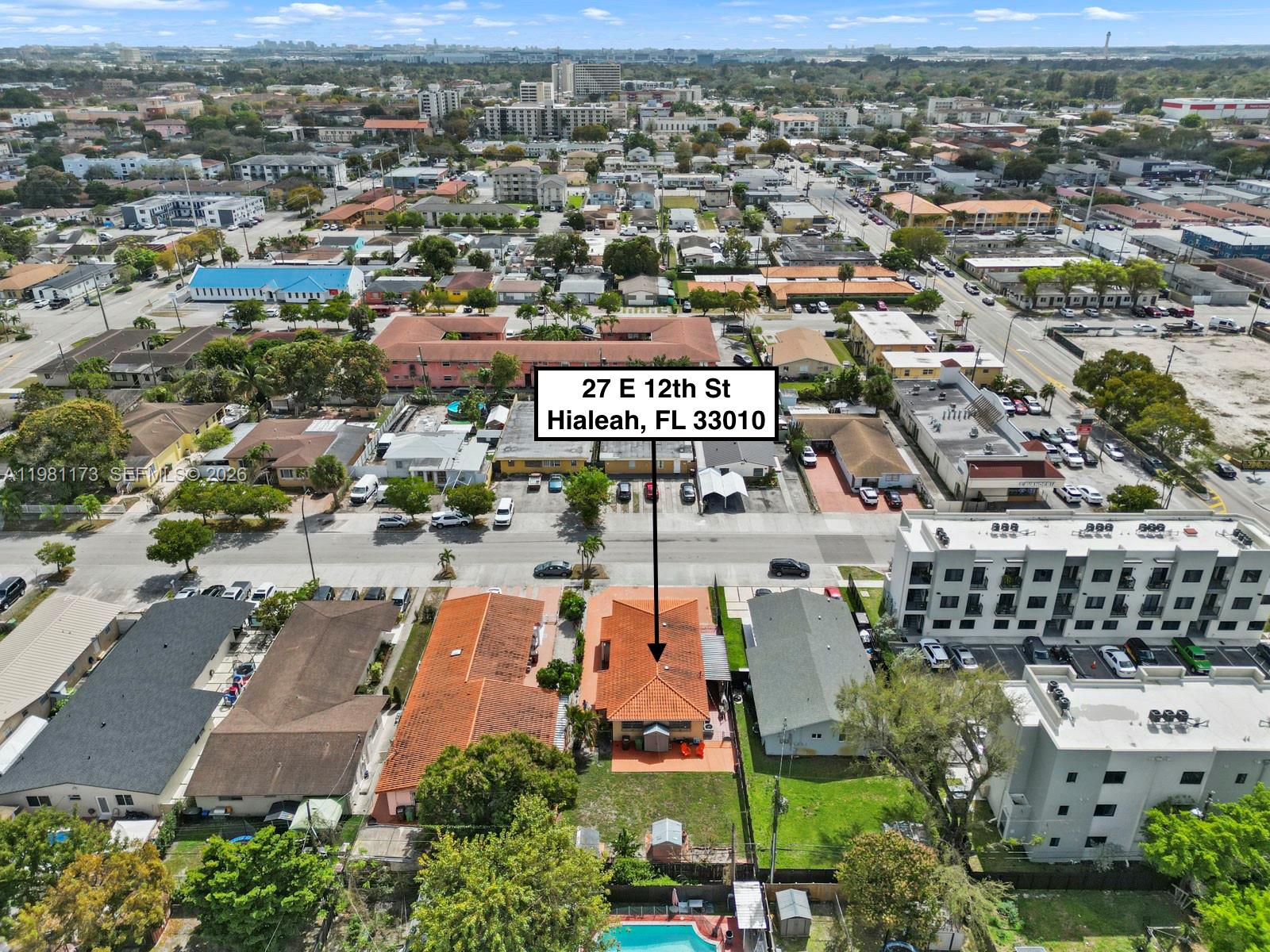 27 East 12th Street Hialeah, FL 33010 - Photo 5 of 24 an aerial view of a city with lots of residential buildings