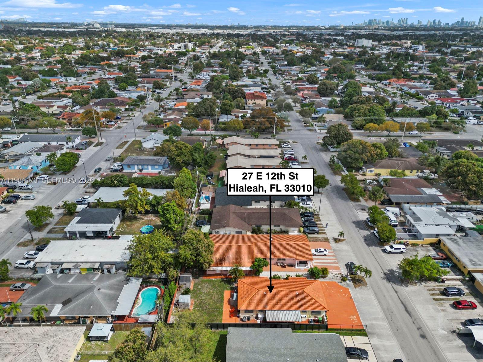 27 East 12th Street Hialeah, FL 33010 - Photo 6 of 24 an aerial view of residential houses with outdoor space