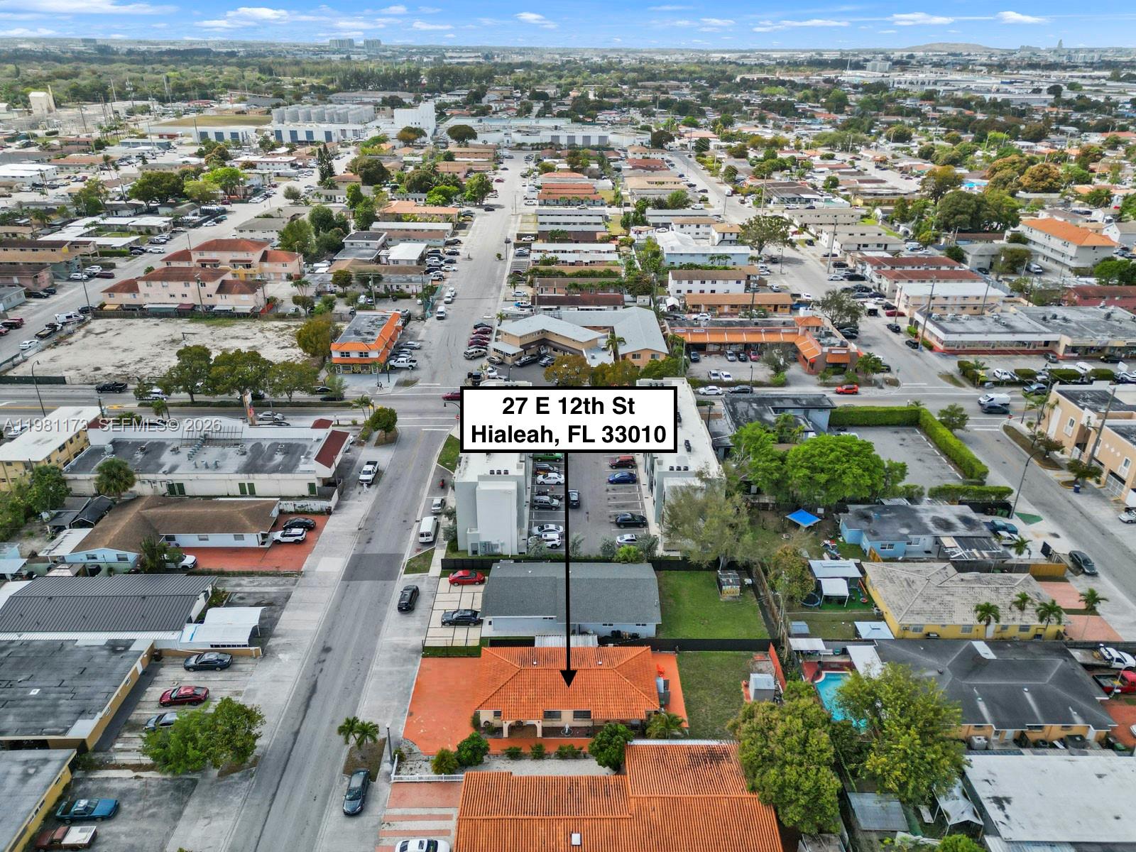 27 East 12th Street Hialeah, FL 33010 - Photo 7 of 24 an aerial view of residential houses with outdoor space