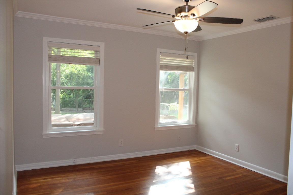 1515 Morrow Street Austin, TX 78757 - Photo 21 of 28 Bedroom 3 has windows that look to the back yard