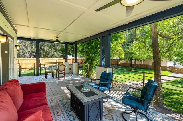 a bedroom with a bed and a lamp