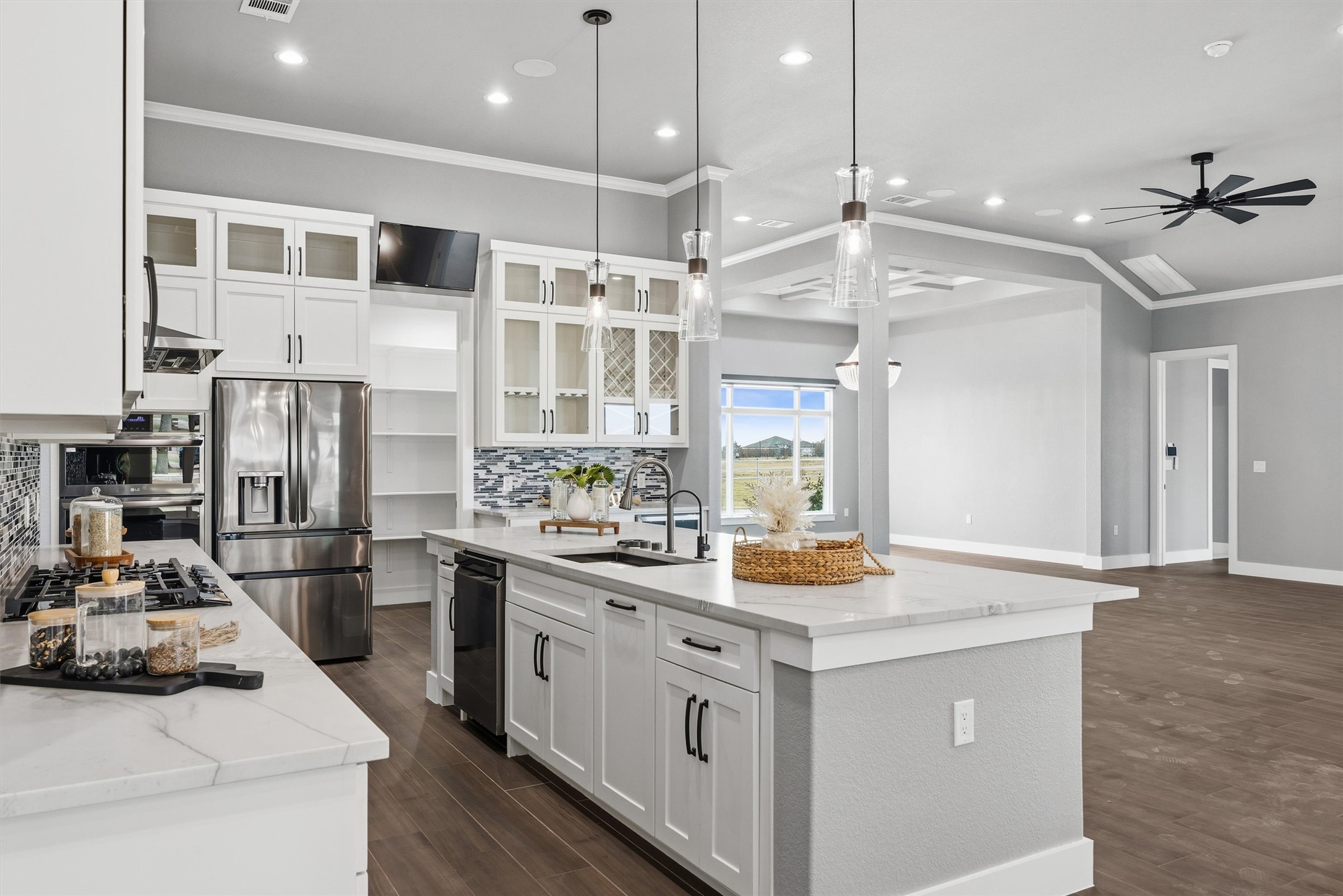 178 Balch Road Elgin, TX 78621 - Photo 8 of 40 a kitchen with a sink stove and refrigerator