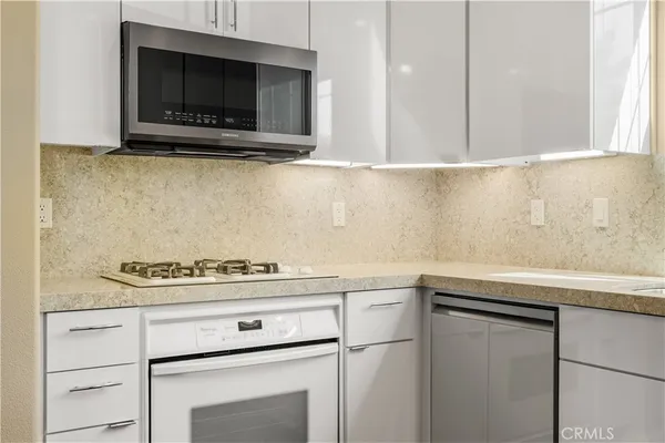 a close view of a sink and a mirror