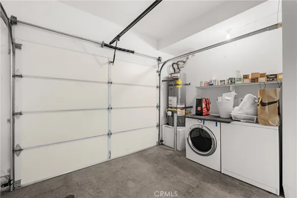 a view of a backyard with floor to ceiling windows with wooden floor