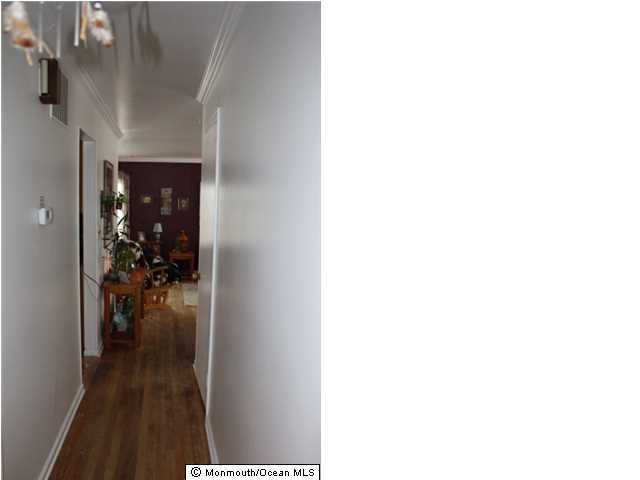 1137 Leonard Road Point Pleasant, NJ 08742 - Photo 13 of 25 a view of a hallway with a living room